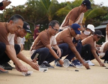 Finnet Perkuat Komitmen ESG Lewat Pelepasan Tukik di Pantai Nusa Dua Bali