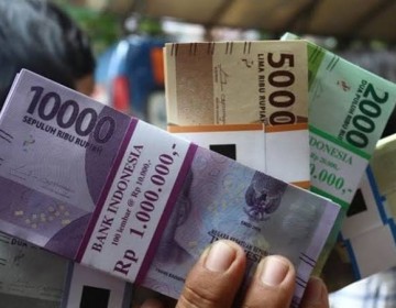 Tukar Uang Receh Lebaran dan Hukum Pidana